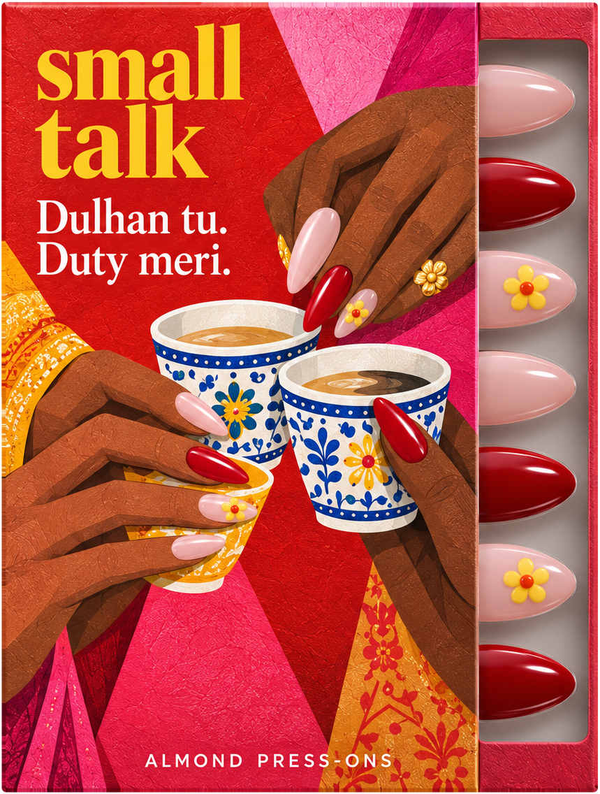 Shaadi Shift press-on nail box by Small Talk, illustrated front, with pink, deep red and yellow-flower nails in the tray.