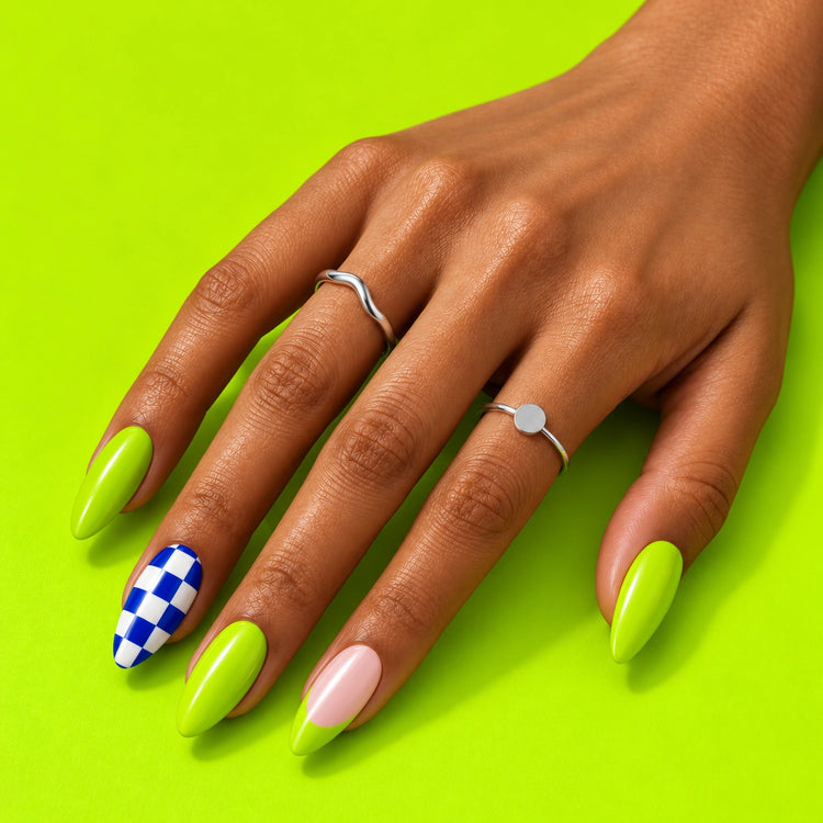 A hand on lime wearing Wild Card: lime, blush with a lime tip, and blue-and-white checks.